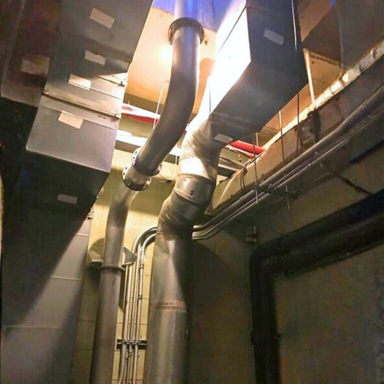 Non ferrous cryogen ductwork and supports running through the building's internal mechanical space.