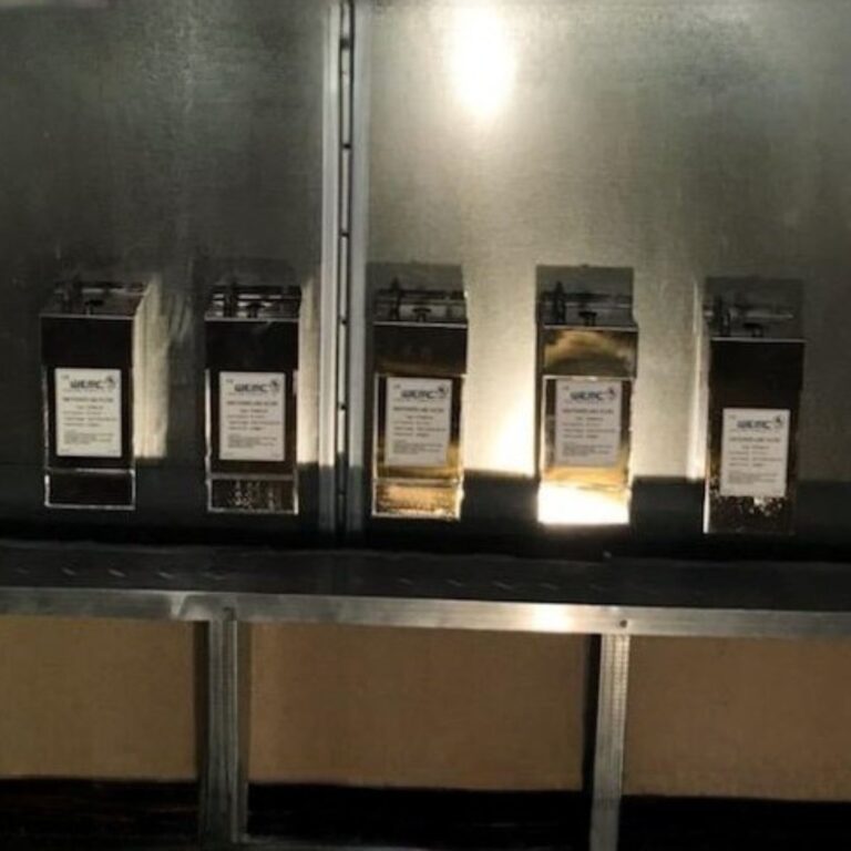 Bank of power line filters (PLFs) installed into the RF shield to supply clean electrical power.