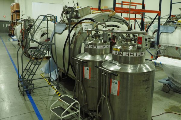 Liquid helium supply for MRI magnet cooling. High purity helium for medical imaging equipment and cryostat maintenance.