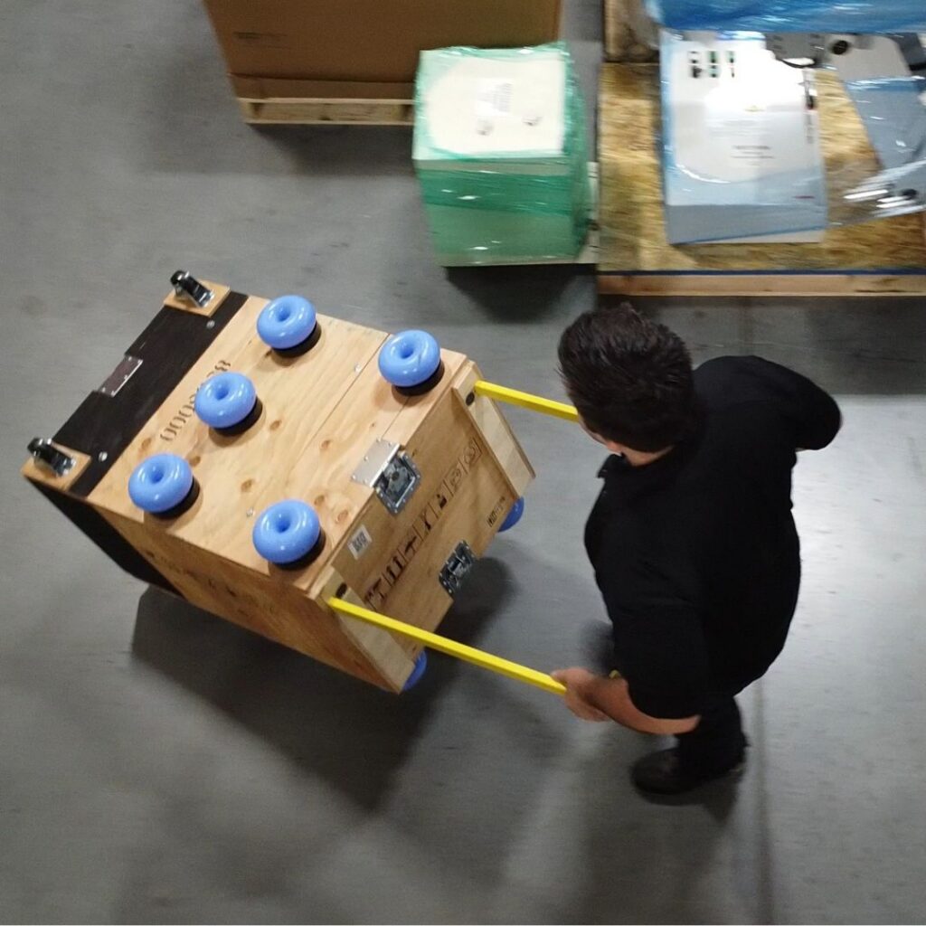An X-ray tube secured inside a custom shipping crate at an MXR logistics center.