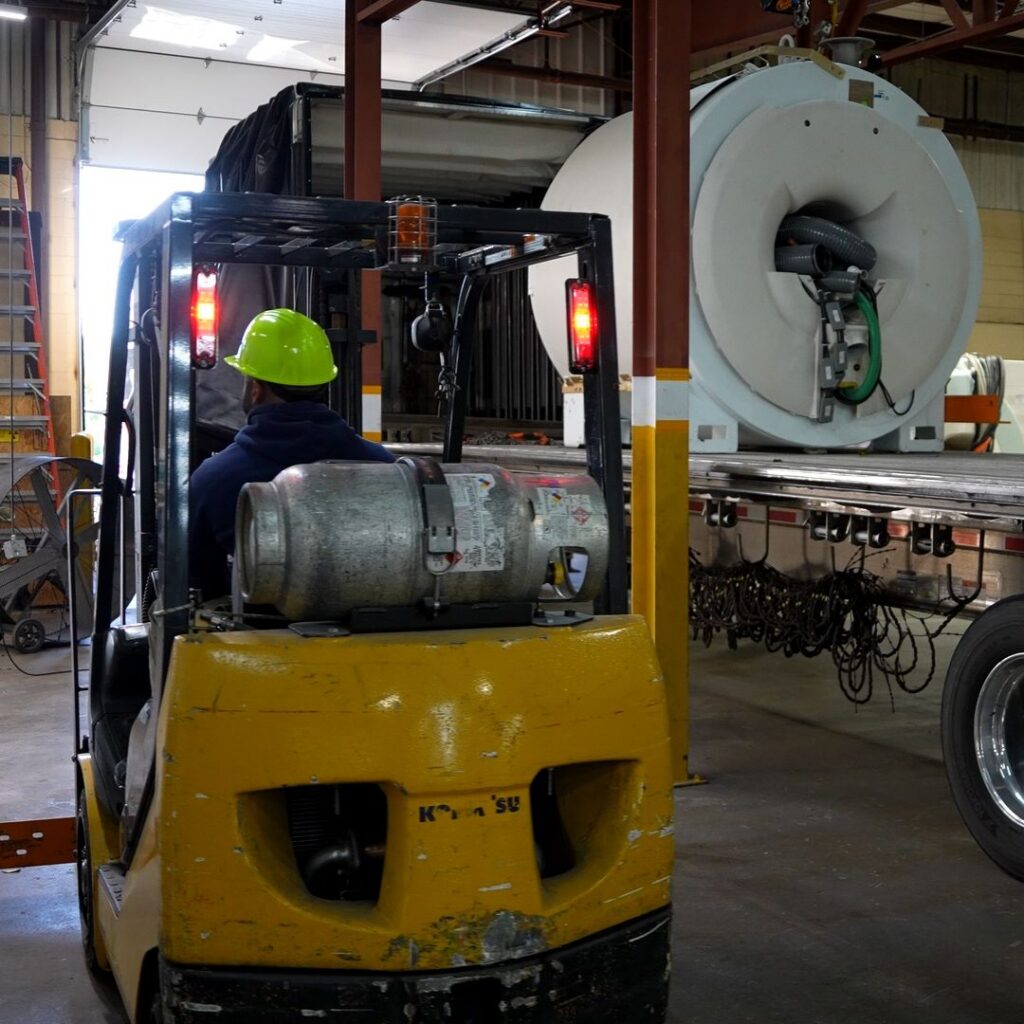 mri magnet hoisting semi truck transport