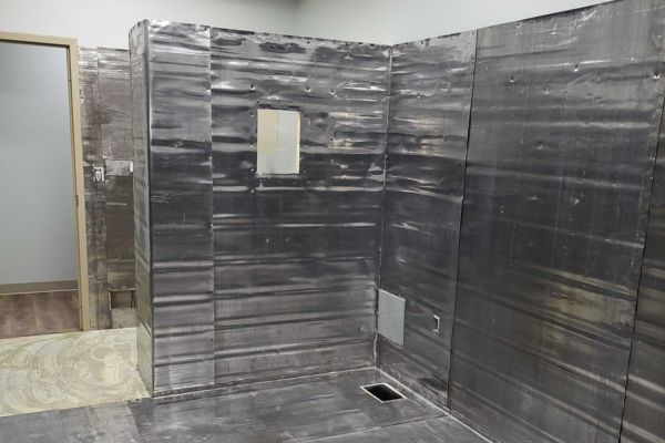 Lead shielding installation for X ray room radiation protection during medical facility construction.